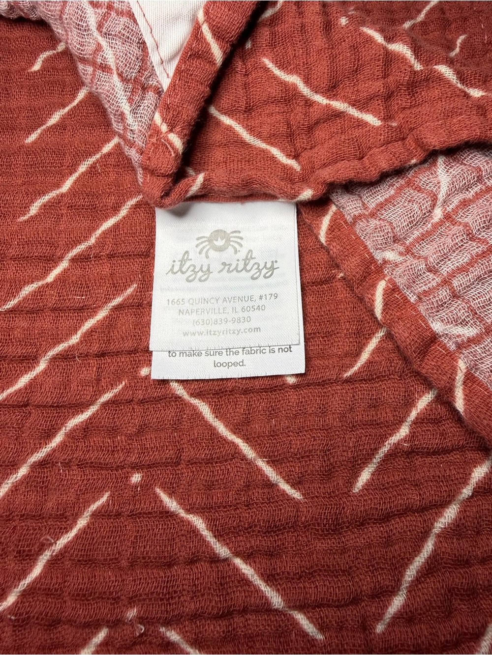 Itzy Ritzy Rust Red Chevron Muslin Swaddle - Picture 3 of 4